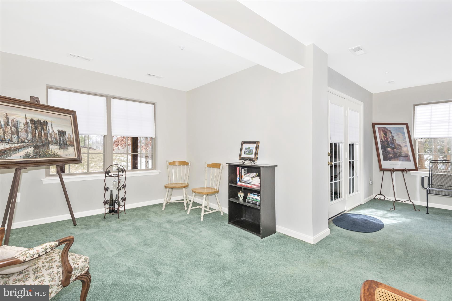 2400 Rippling Brook Road Frederick, MD 21701 - Photo 21 of 30 Spacious L-shaped rec room in walkout lower level
