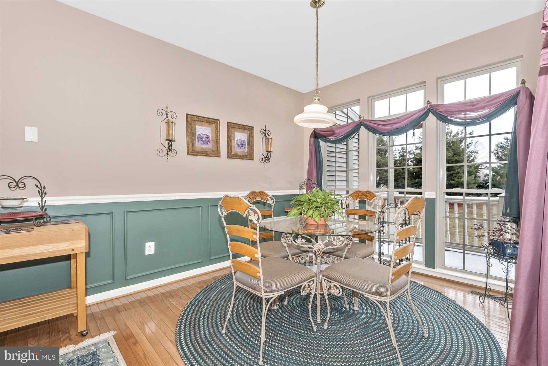 2400 Rippling Brook Road Frederick, MD 21701 - Photo 9 of 30 Breakfast nook with transom windows, door to deck