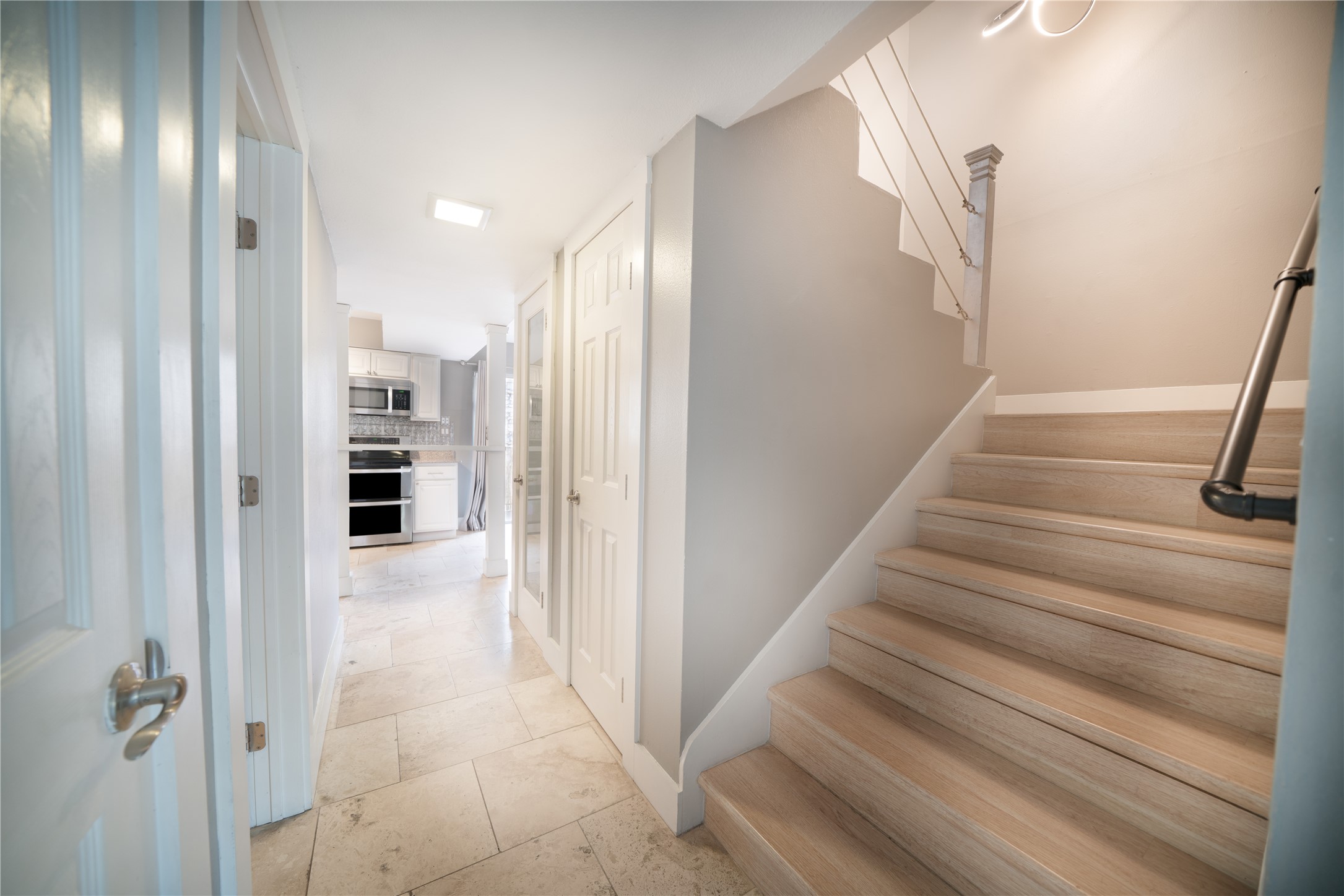 500 East Riverside Drive, Unit 242 Austin, TX 78704 - Photo 17 of 40 Stairs featuring baseboards