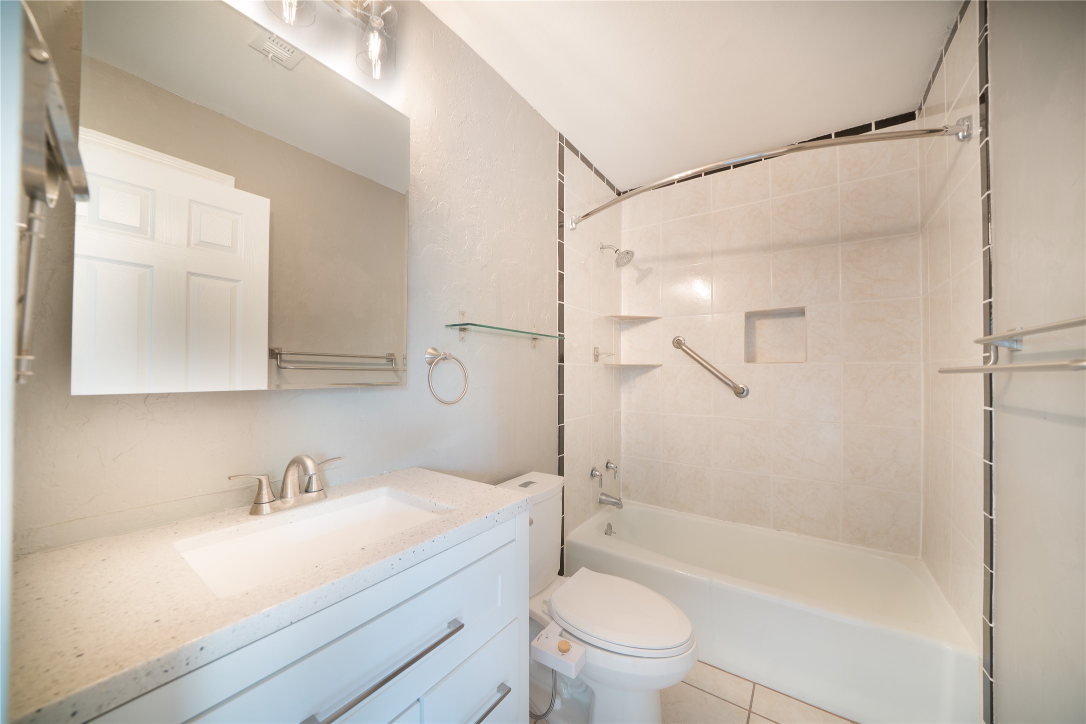 500 East Riverside Drive, Unit 242 Austin, TX 78704 - Photo 29 of 40 Full bath featuring vanity, toilet, visible vents, and shower / bathtub combination