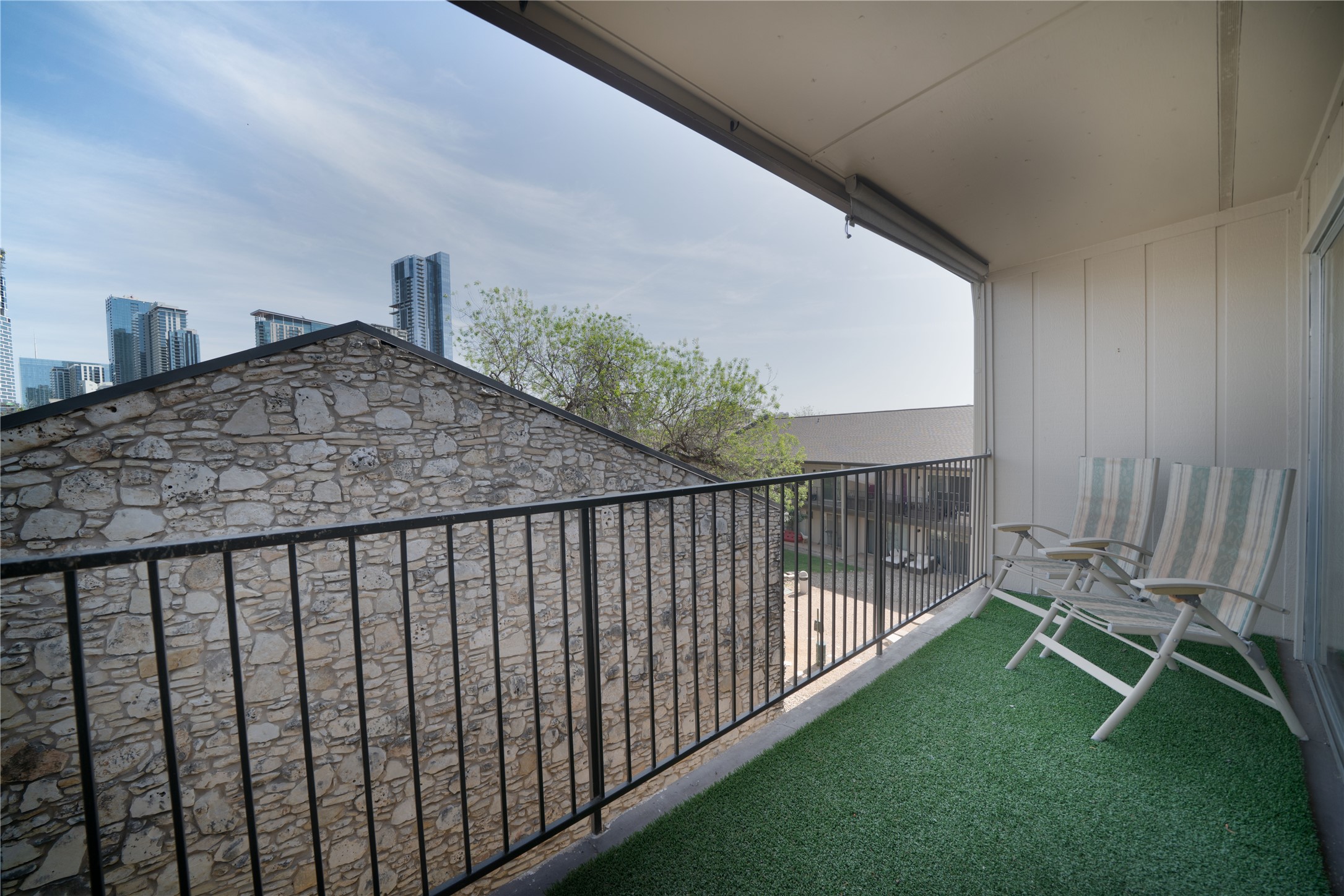 500 East Riverside Drive, Unit 242 Austin, TX 78704 - Photo 30 of 40 Balcony featuring a view of city