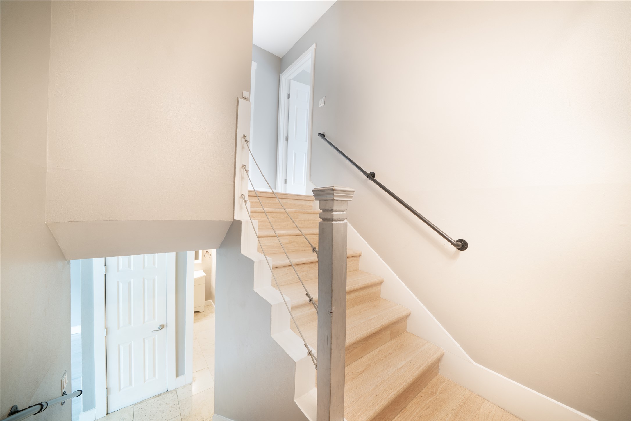 500 East Riverside Drive, Unit 242 Austin, TX 78704 - Photo 32 of 40 Stairway with baseboards