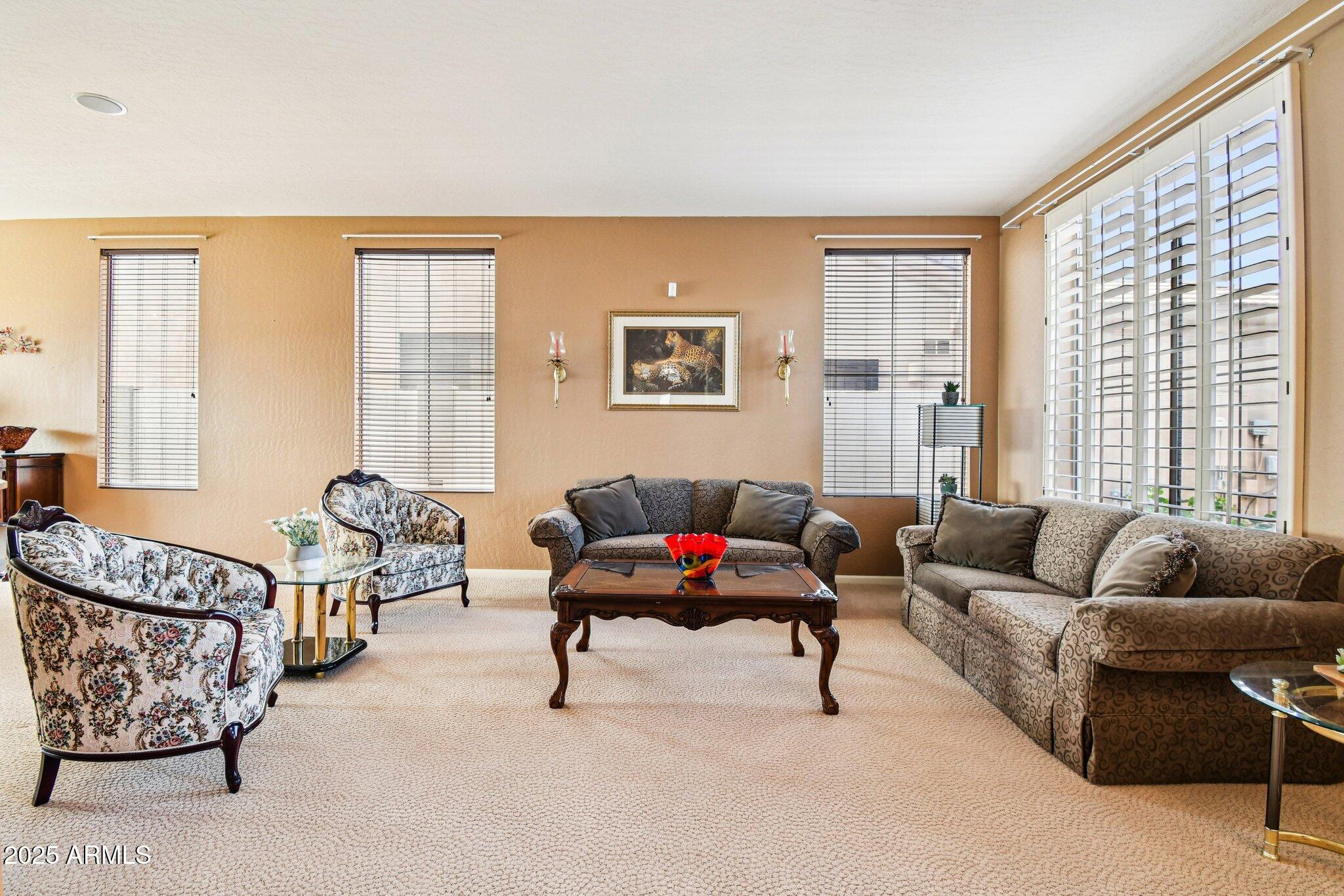 923 West Windsong Drive Phoenix, AZ 85045 - Photo 14 of 57 a living room with furniture and a window