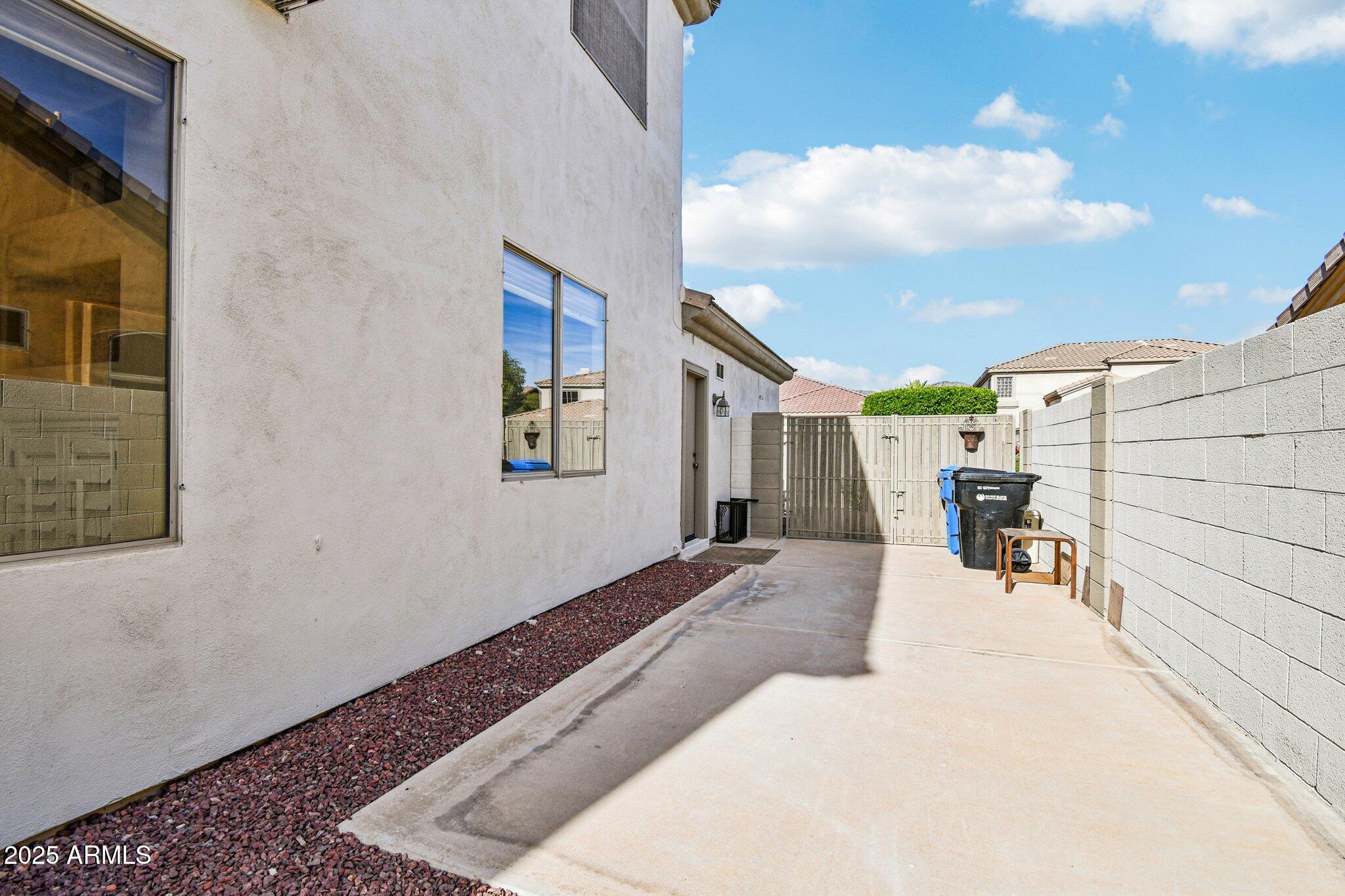 923 West Windsong Drive Phoenix, AZ 85045 - Photo 45 of 68 RV Gate with Large concrete slab
