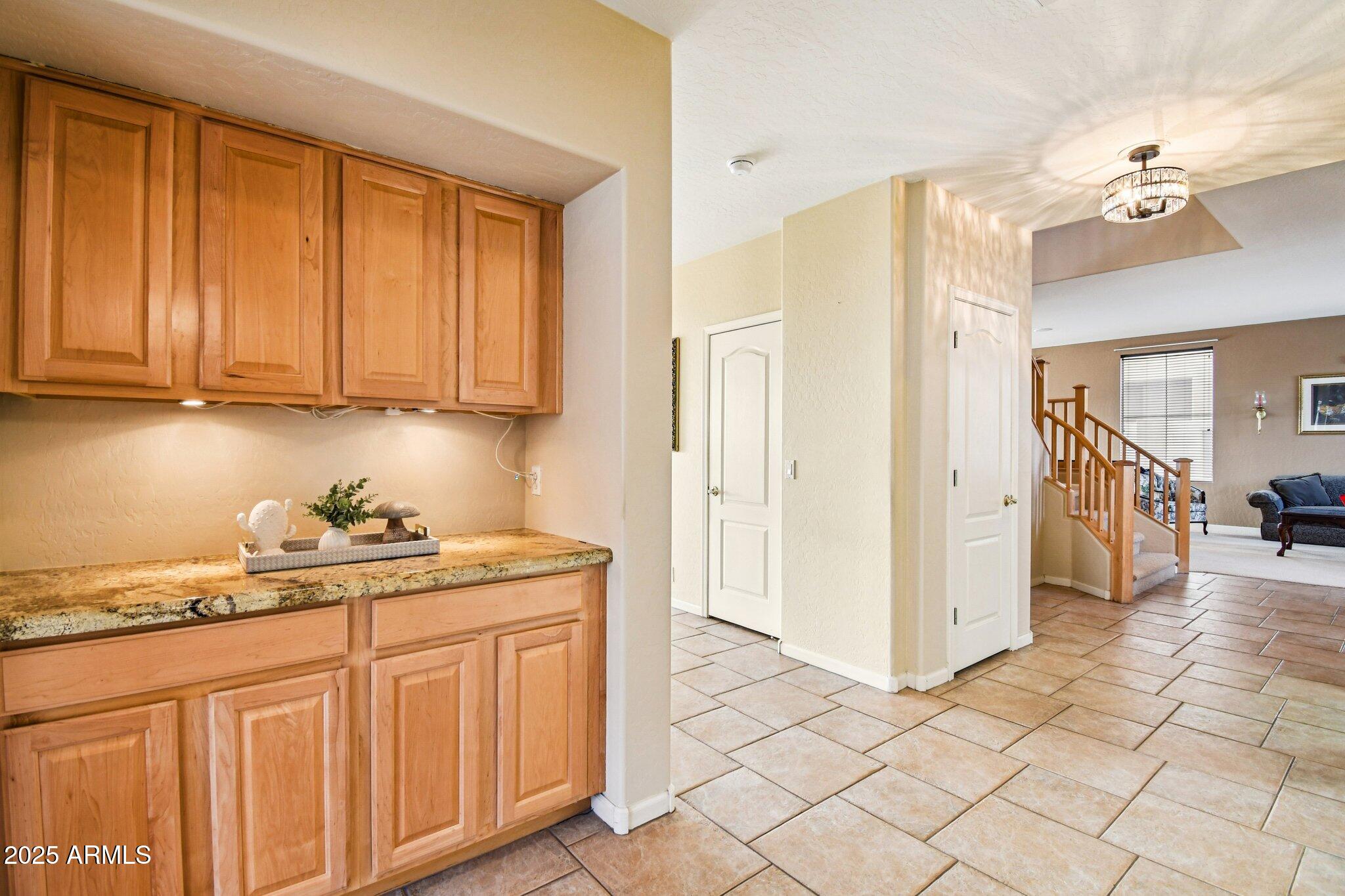 923 West Windsong Drive Phoenix, AZ 85045 - Photo 54 of 57 a kitchen with stainless steel appliances granite countertop a granite counter tops and a view of living room