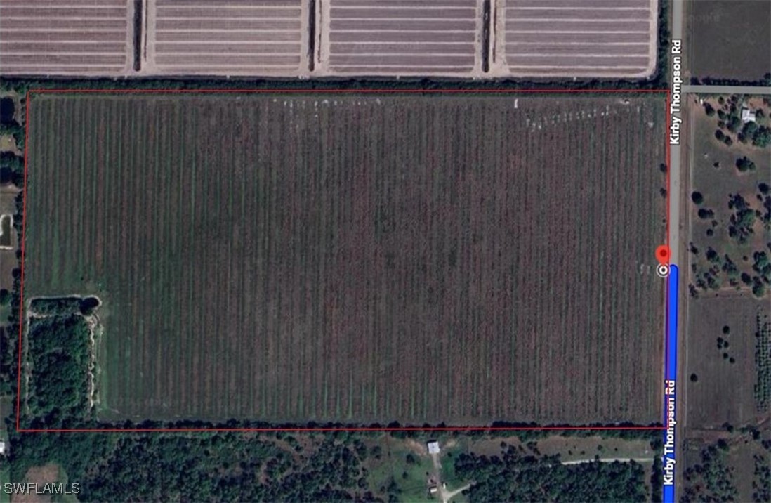 Kirby Thompson Road LaBelle, FL 33935 - Photo 12 of 12 a view of a wooden fence