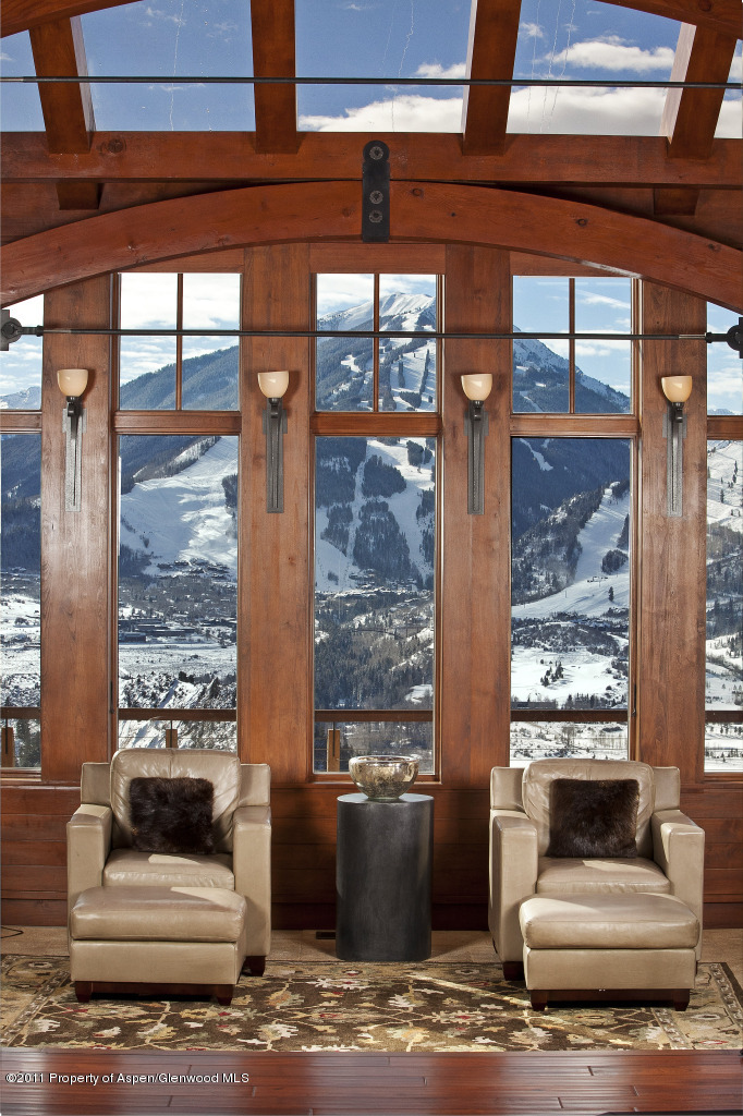 570 Eppley Drive Aspen, CO 81612 - Photo 2 of 23 a living room with large windows