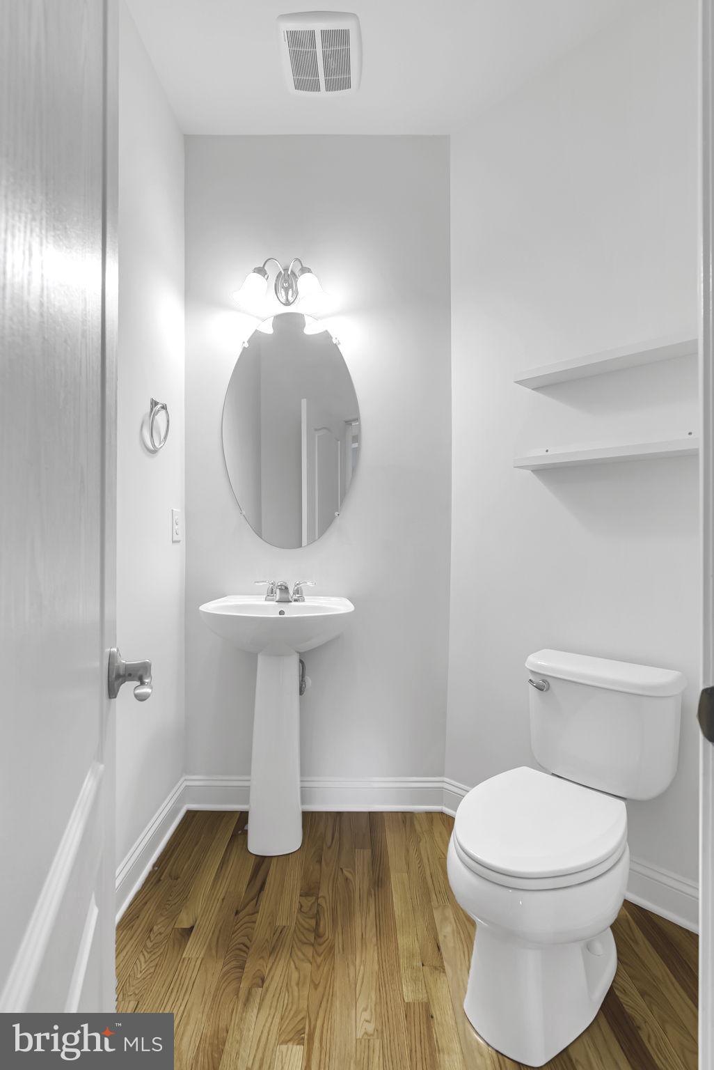 40560 Aldie Springs Drive Aldie, VA 20105 - Photo 23 of 68 a bathroom with a sink toilet and a mirror
