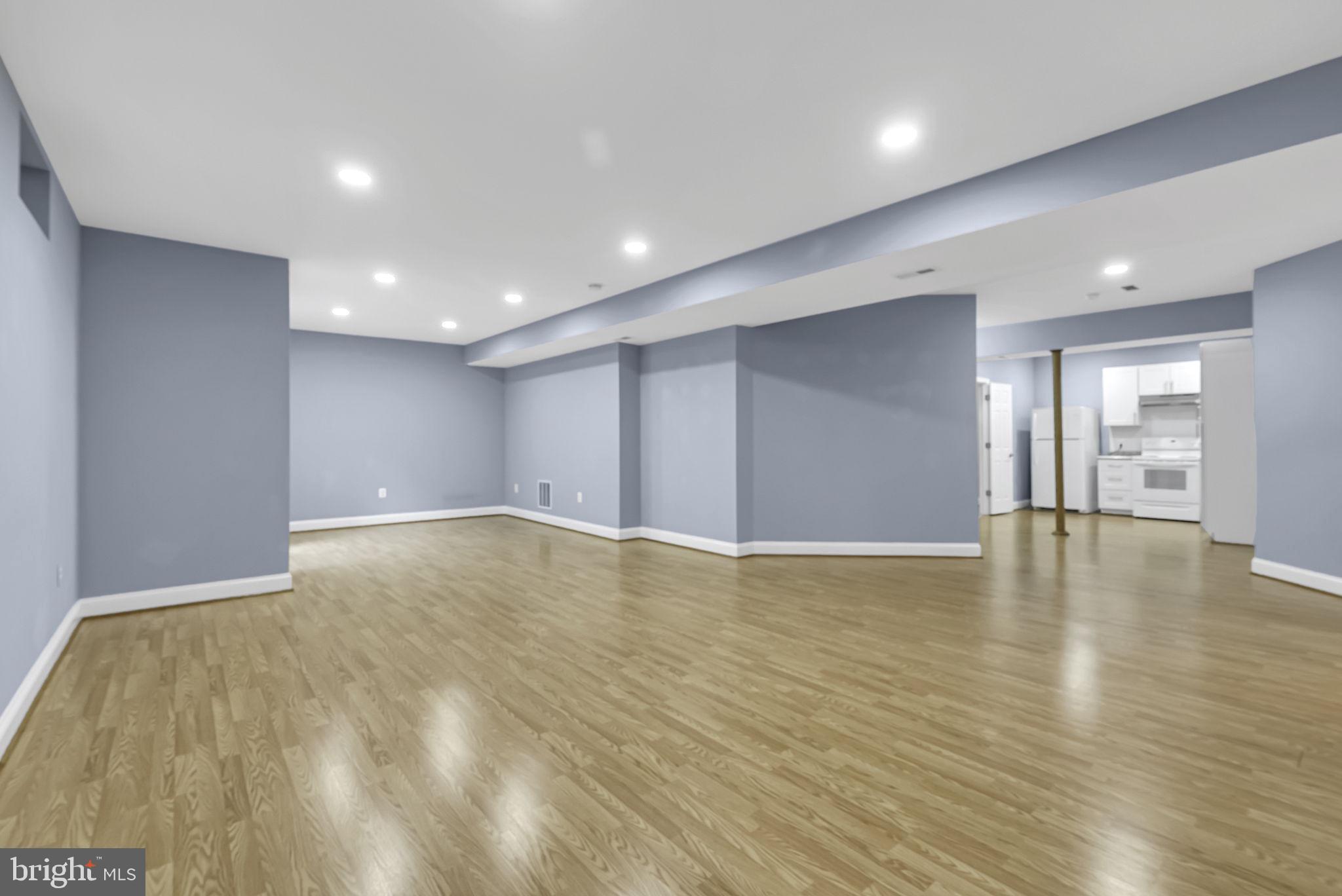 40560 Aldie Springs Drive Aldie, VA 20105 - Photo 53 of 68 a view of empty room with wooden floor and windows