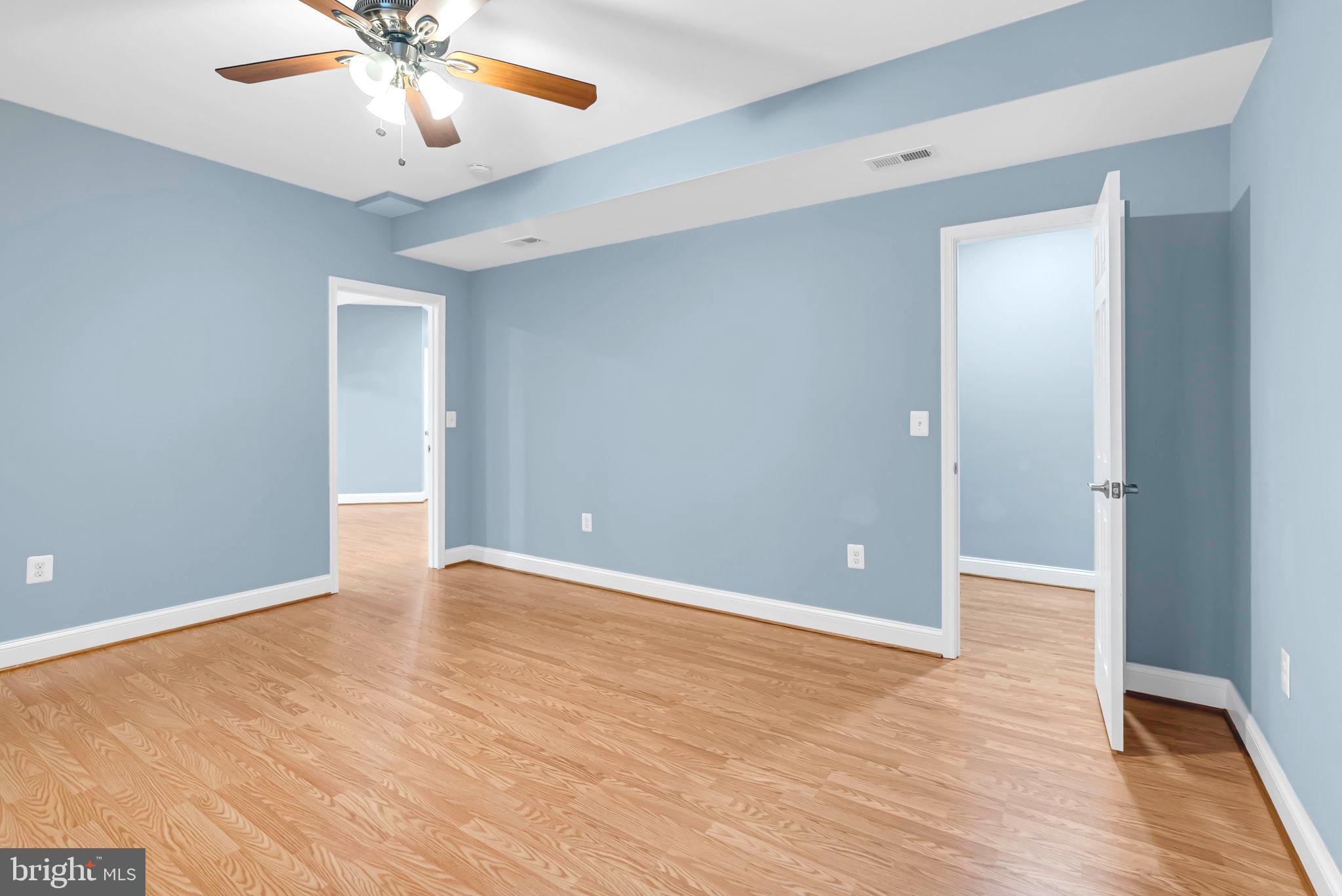 40560 Aldie Springs Drive Aldie, VA 20105 - Photo 55 of 68 a view of an empty room with wooden floor