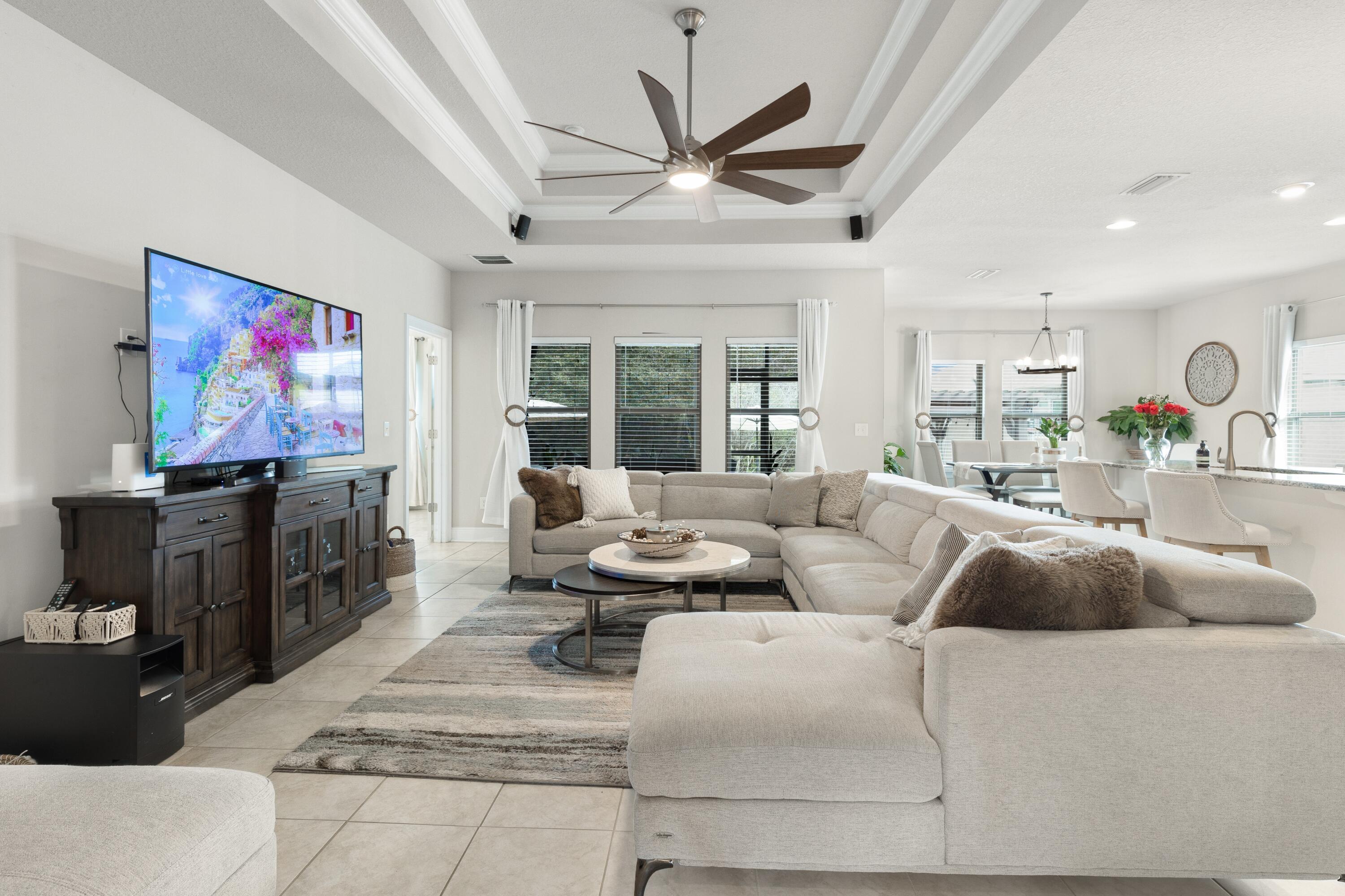 114 Maddox Street Santa Rosa Beach, FL 32459 - Photo 7 of 31 a living room with furniture and a flat screen tv
