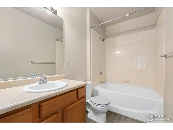 a bathroom with a sink a toilet and a bathtub