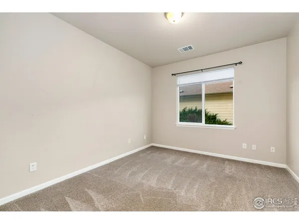 an empty room with window