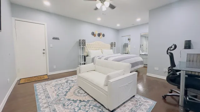 a bed room with a bed furniture and a window