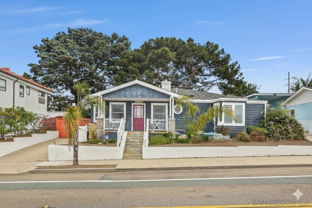 3335 Riviera Drive San Diego, CA 92109 - Photo 3 of 22 a front view of a house with a yard