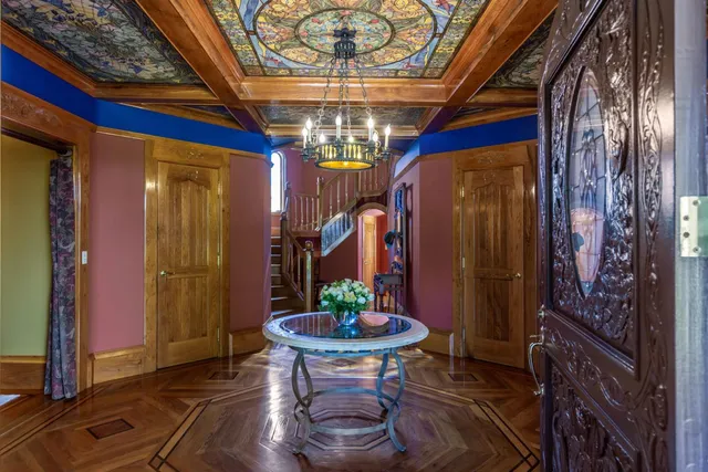 a room with furniture and a chandelier