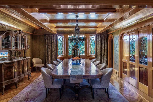 a view of a dining room with furniture window and outside view