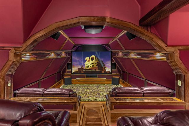 a view of a balcony with table and chairs with wooden floor