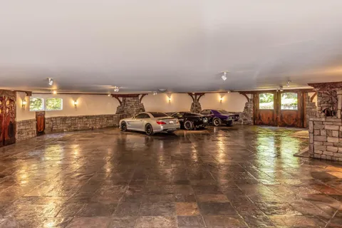 a wooden bench sitting in front of a building