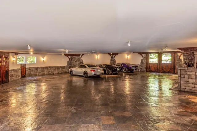 a wooden bench sitting in front of a building