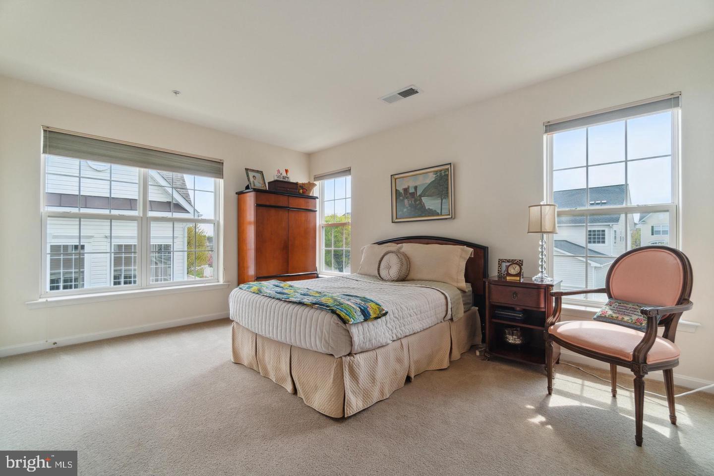 2326 Campus Way North Bowie, MD 20721 - Photo 15 of 31 a spacious bedroom with a bed and window