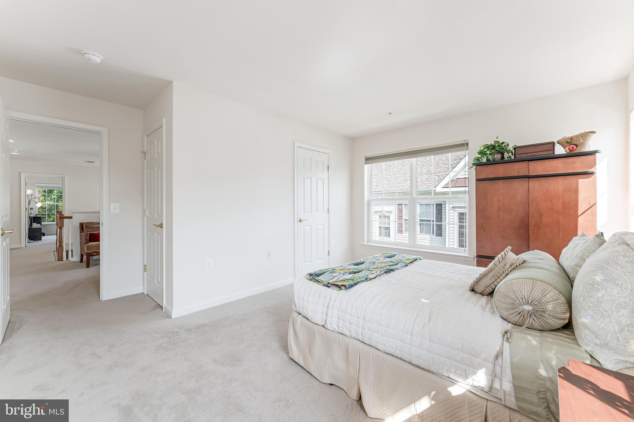 2326 Campus Way North Bowie, MD 20721 - Photo 16 of 31 a bedroom with a bed and a window