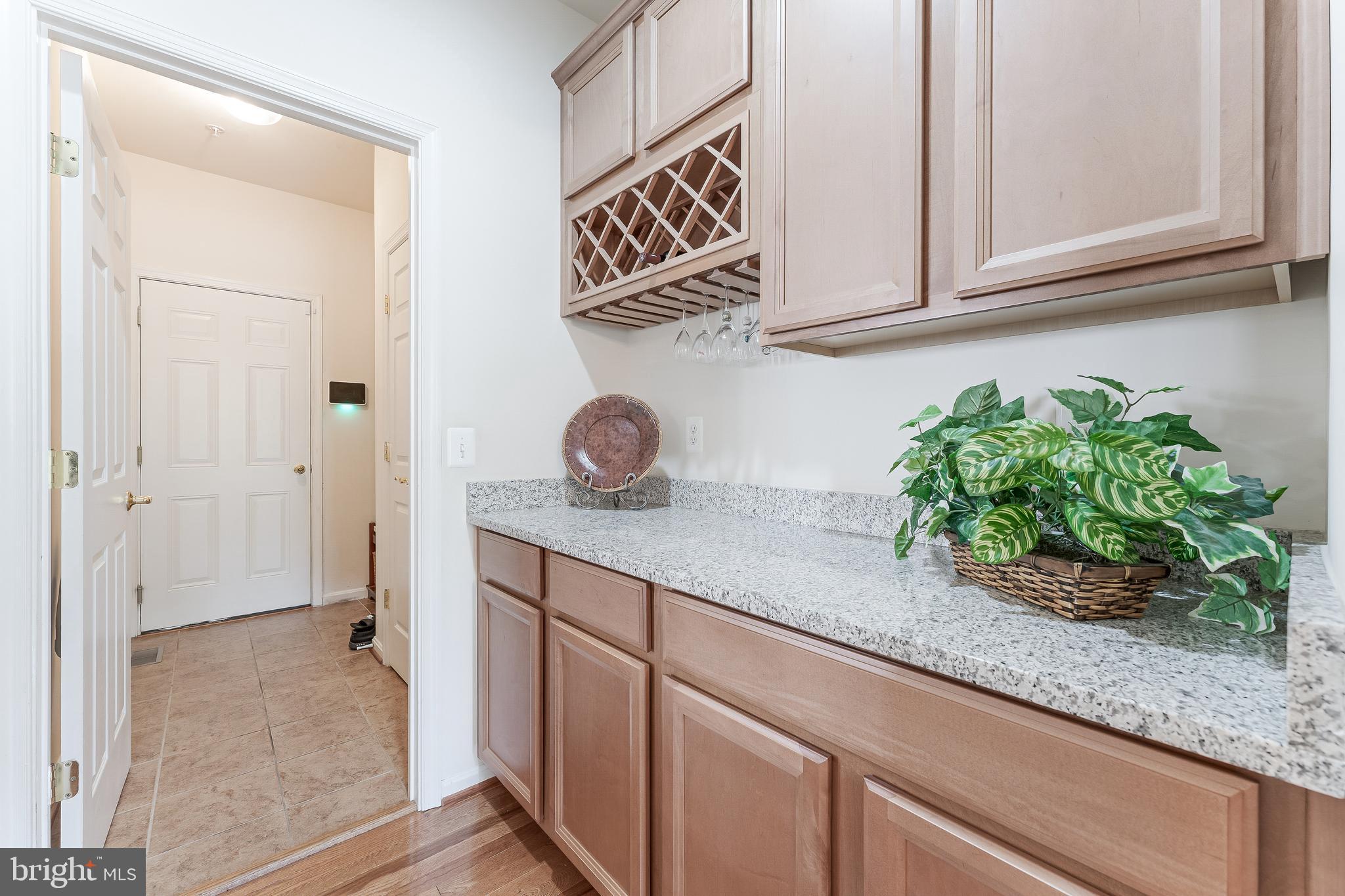 2326 Campus Way North Bowie, MD 20721 - Photo 6 of 31 a kitchen with a sink and cabinets