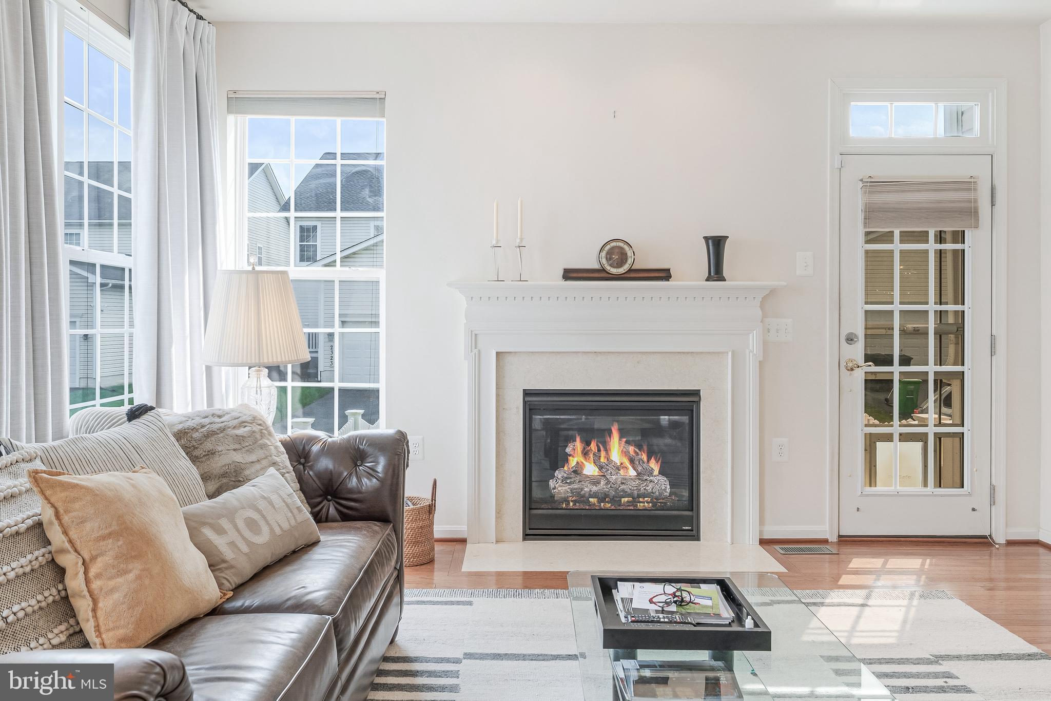 2326 Campus Way North Bowie, MD 20721 - Photo 7 of 31 a living room with furniture and a fireplace