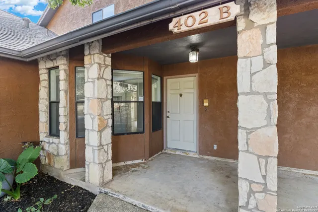a dining room with furniture and a table