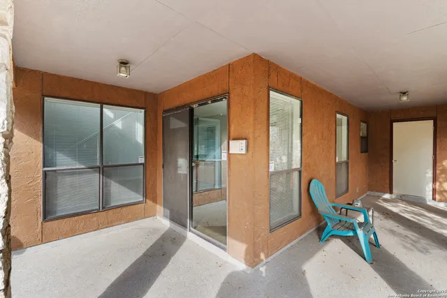 a view of living room with a fireplace