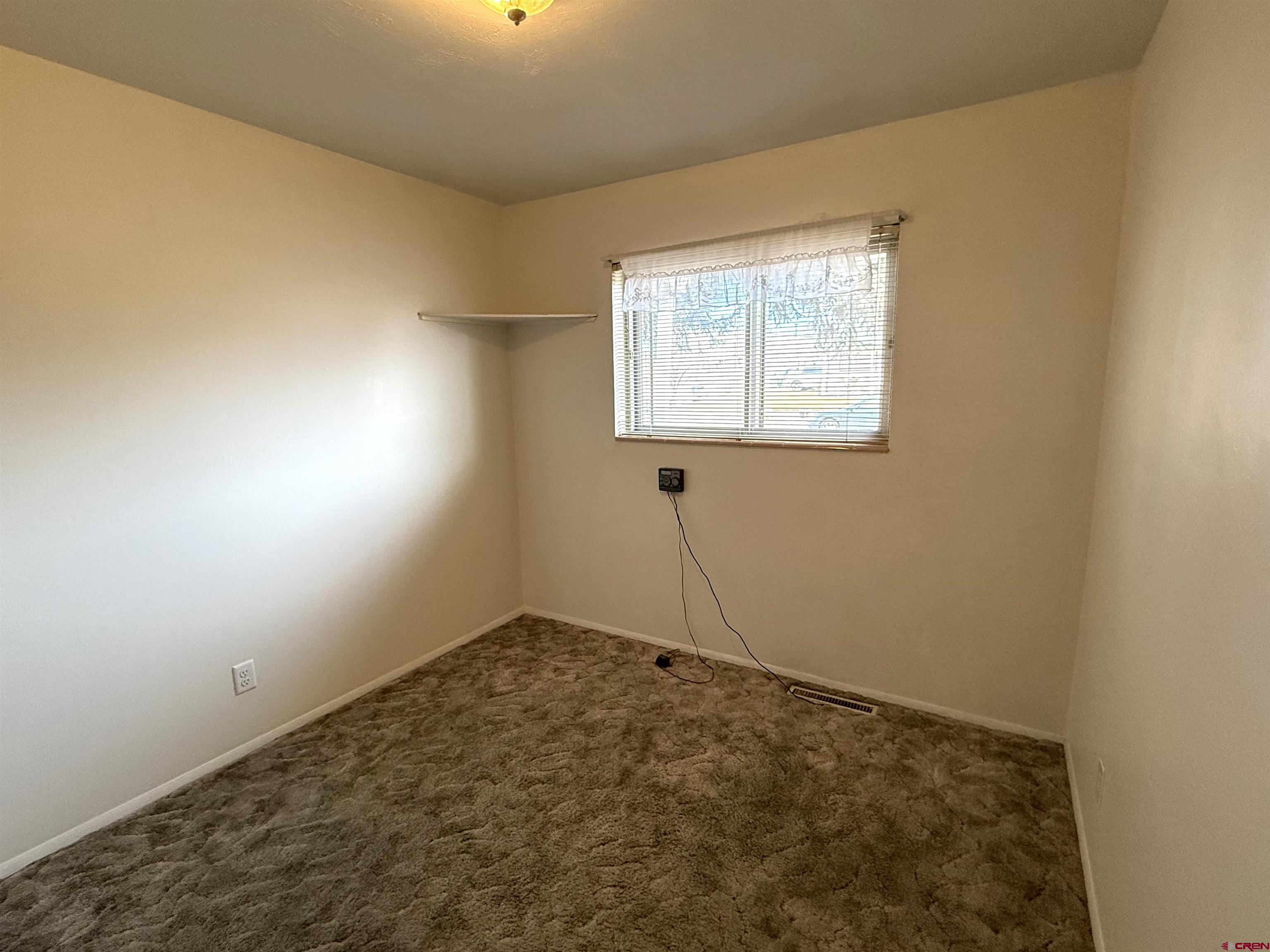 801 East 3rd Street Cortez, CO 81321 - Photo 16 of 22 a view of a room with window