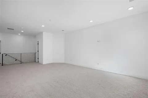 an empty room with white walls and white walls