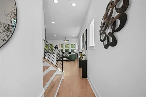 a view of a entryway with furniture and floor to ceiling window