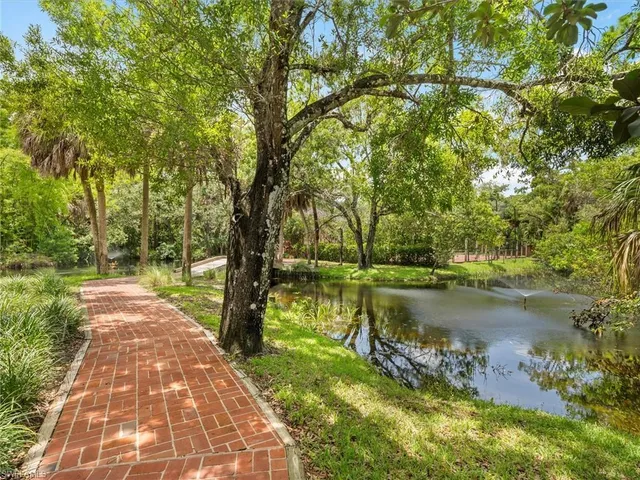 a view of a lake with a building in the background