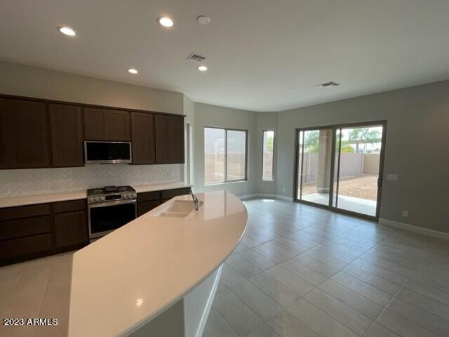 16913 West Almeria Road Goodyear, AZ 85395 - Photo 3 of 5 Unit 55B Lot 5 Kitchen 2