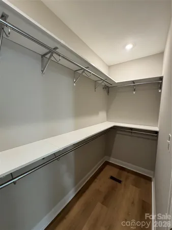 a view of an empty walk in closet