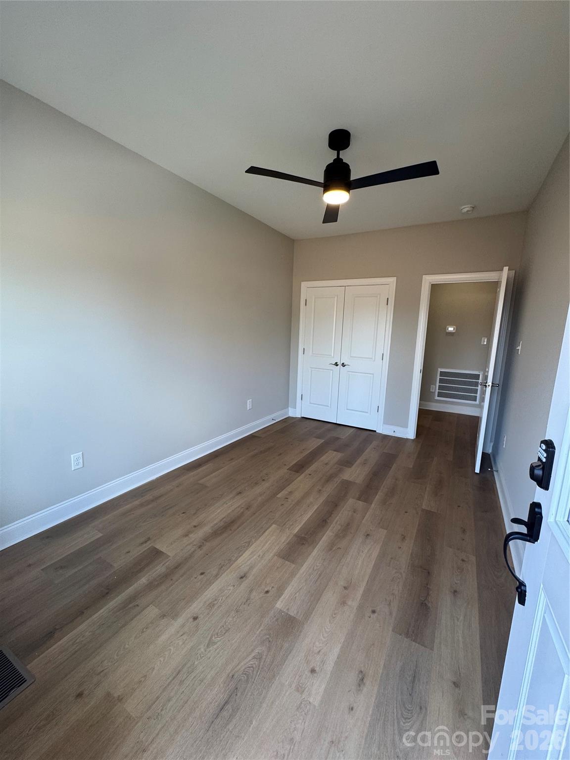 203 Lee Street Fort Mill, SC 29715 - Photo 12 of 19 a view of empty room with wooden floor