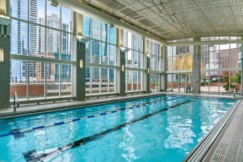 a row of benches sitting on a sidewalk