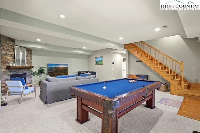 a living room with furniture and a table