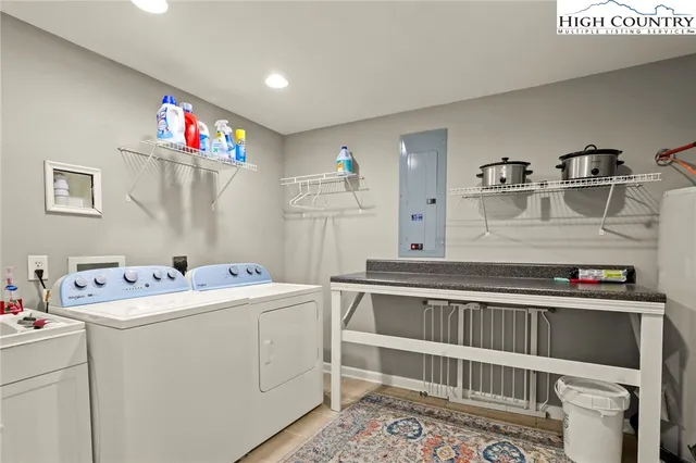 a utility room with washer and dryer