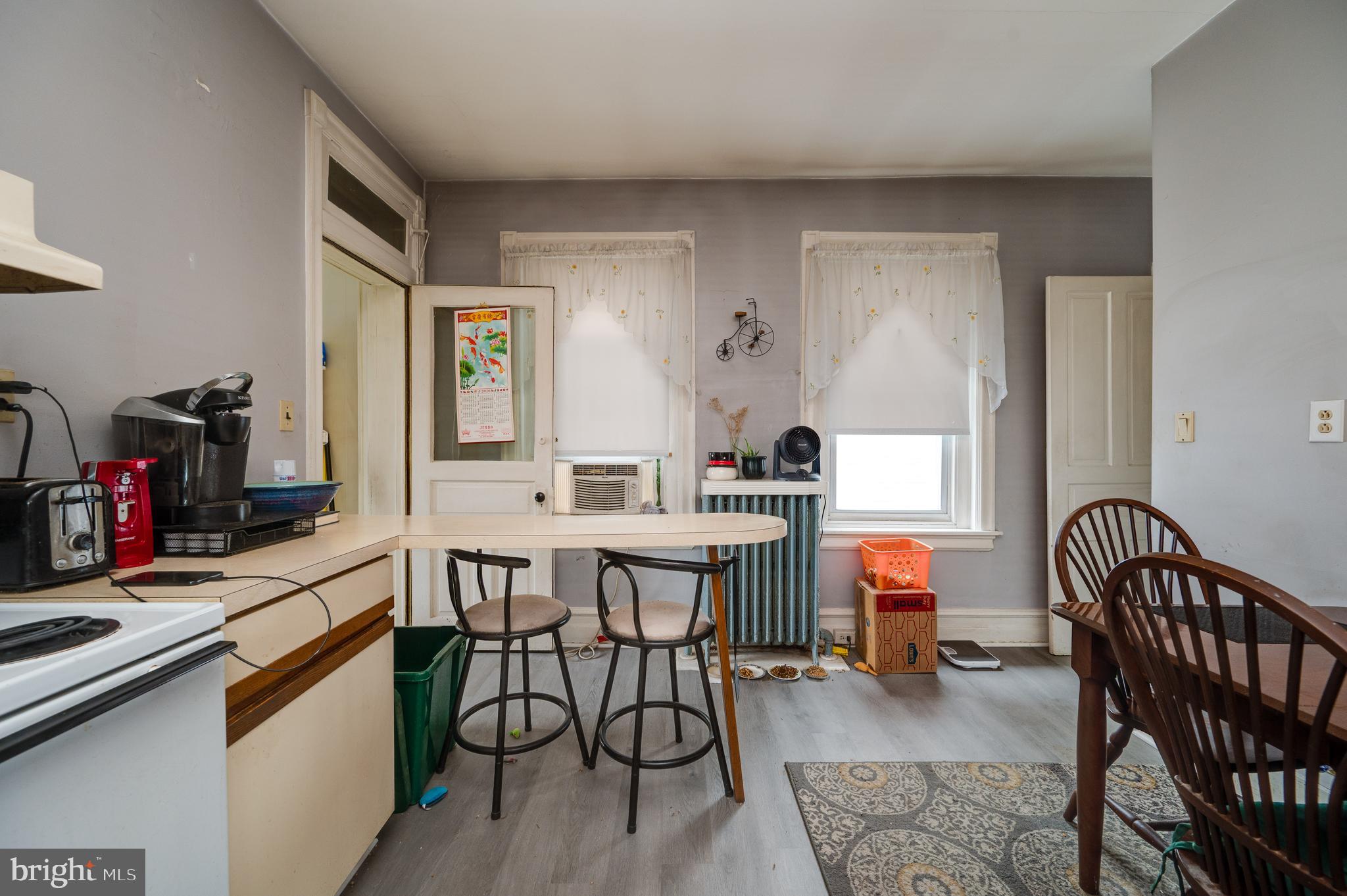 1642 Mineral Spring Road Reading, PA 19602 - Photo 18 of 56 a view of a dining room with furniture and a window