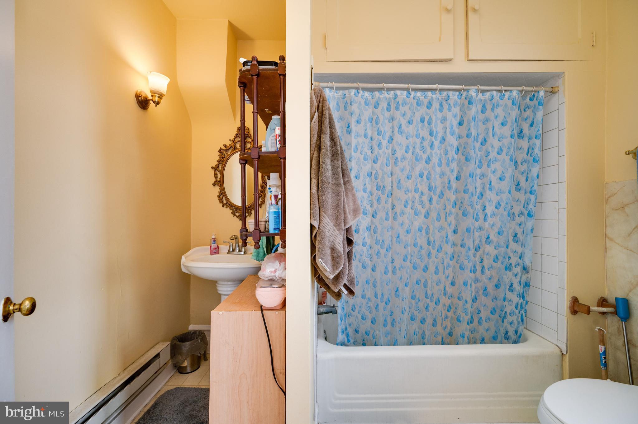 1642 Mineral Spring Road Reading, PA 19602 - Photo 20 of 56 a bathroom with a sink toilet and shower