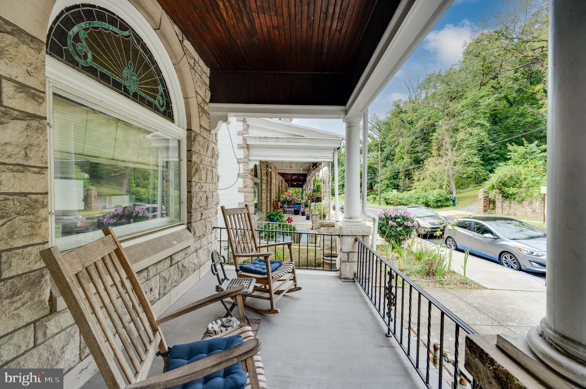 1642 Mineral Spring Road Reading, PA 19602 - Photo 2 of 56 a view of a porch with furniture and garden