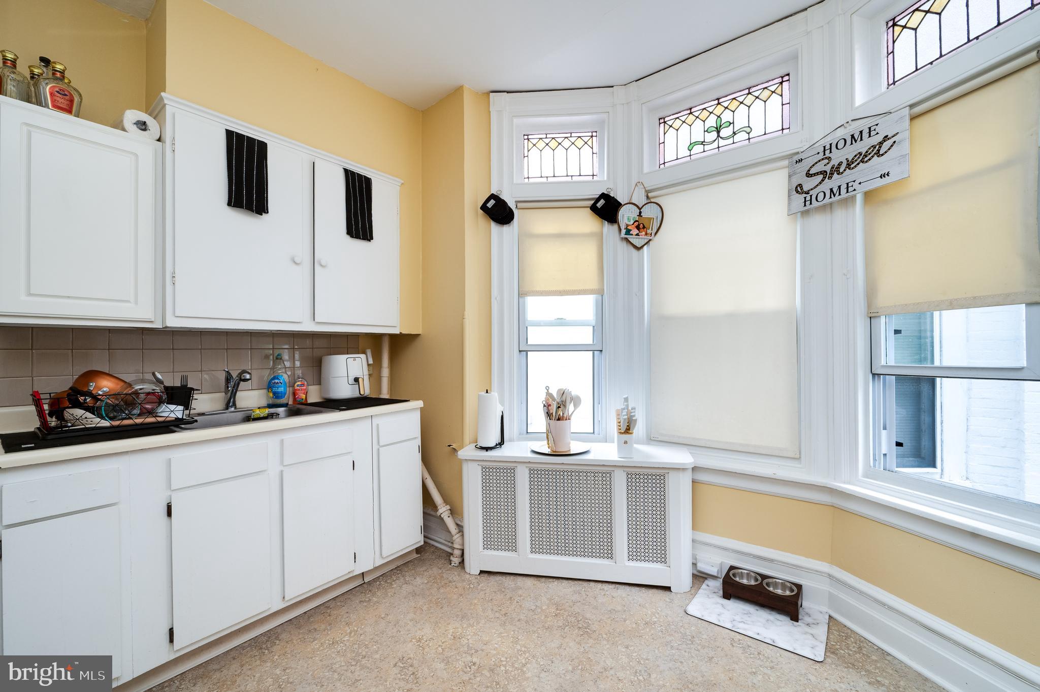 1642 Mineral Spring Road Reading, PA 19602 - Photo 28 of 56 a kitchen with cabinets and window