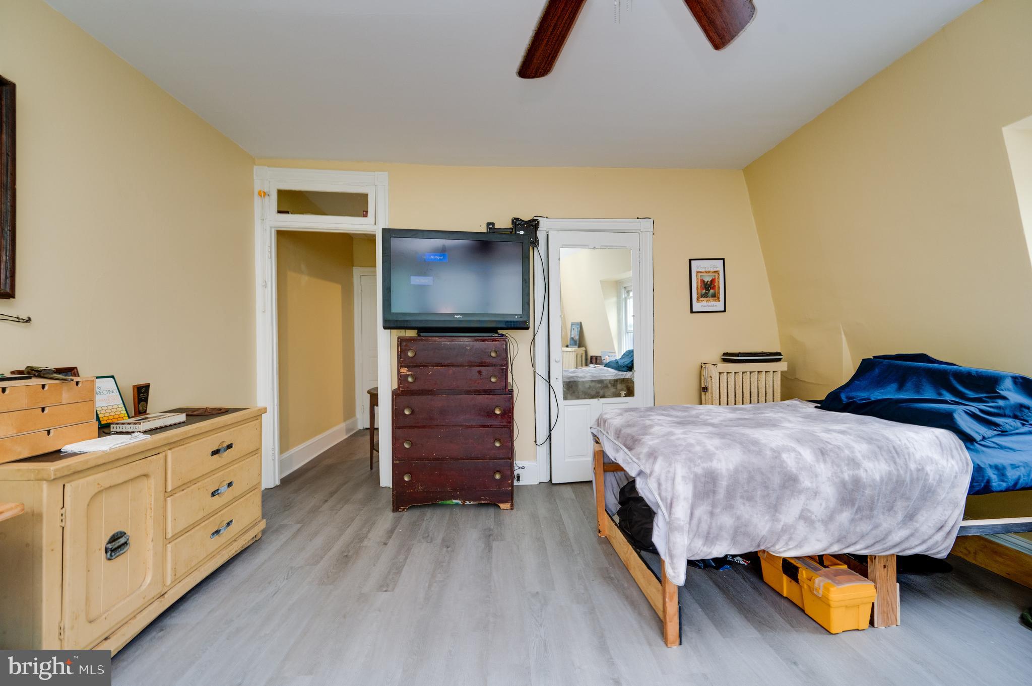 1642 Mineral Spring Road Reading, PA 19602 - Photo 43 of 56 a bedroom with a bed and wooden floor