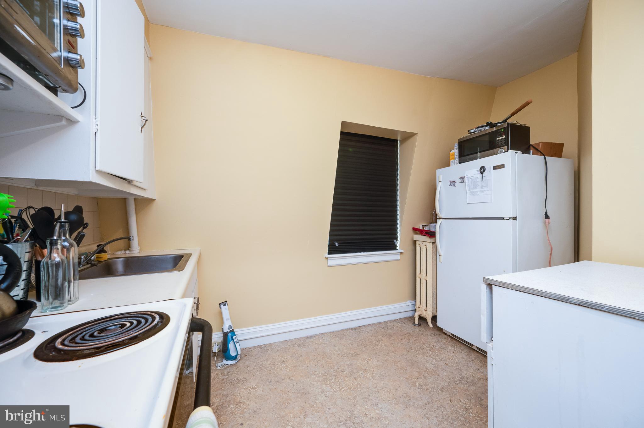 1642 Mineral Spring Road Reading, PA 19602 - Photo 45 of 56 a view of storage and utility room with washer and dryer