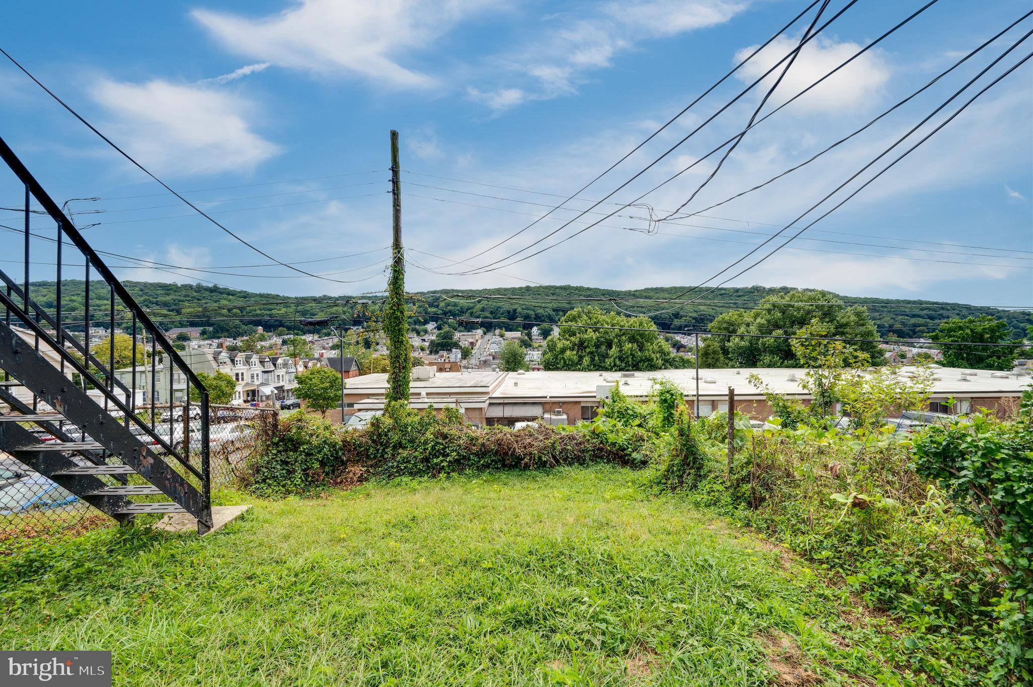 1642 Mineral Spring Road Reading, PA 19602 - Photo 54 of 56 a view of a garden with a slide