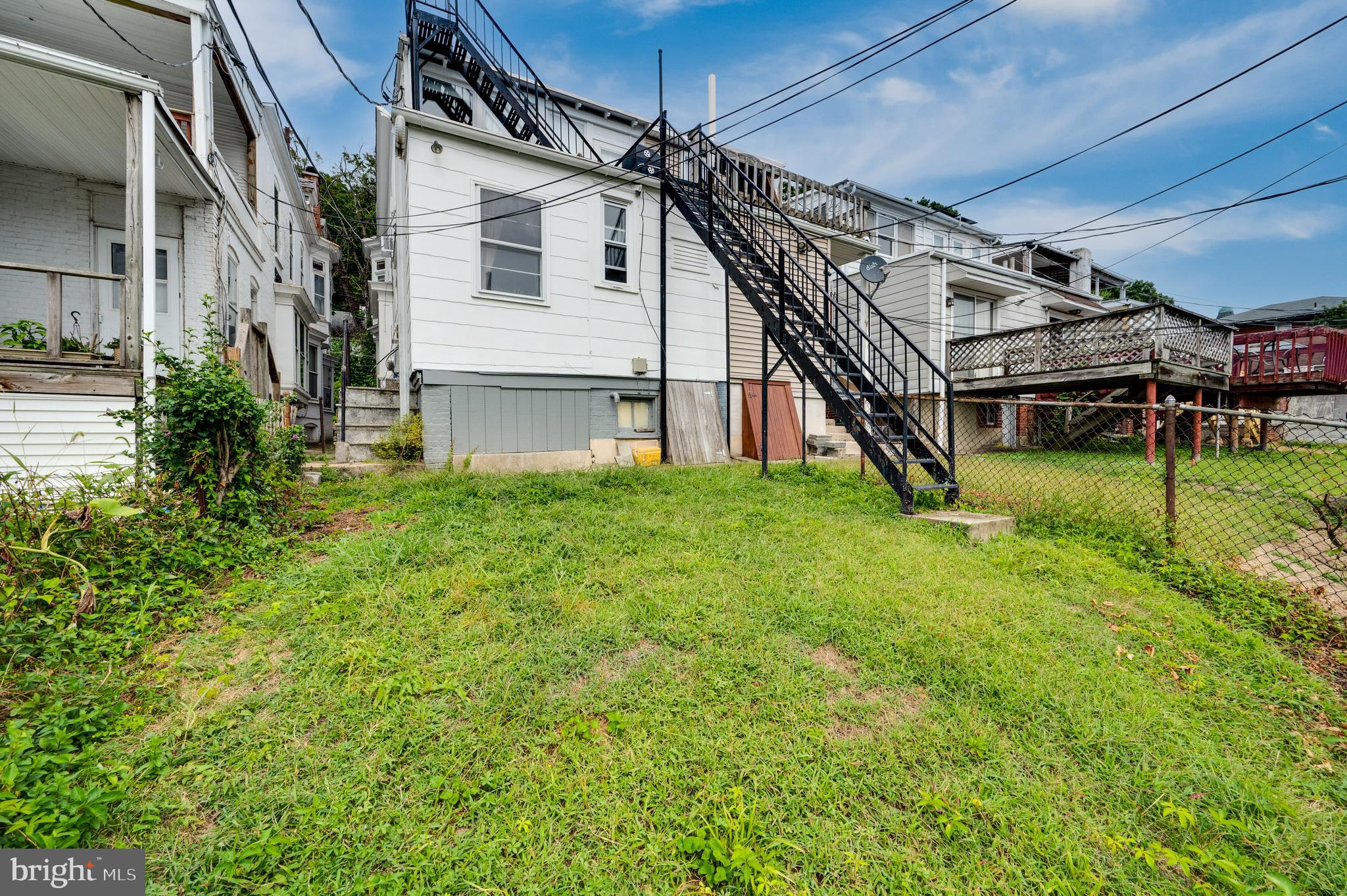 1642 Mineral Spring Road Reading, PA 19602 - Photo 55 of 56 a view of a house with a big yard and large windows