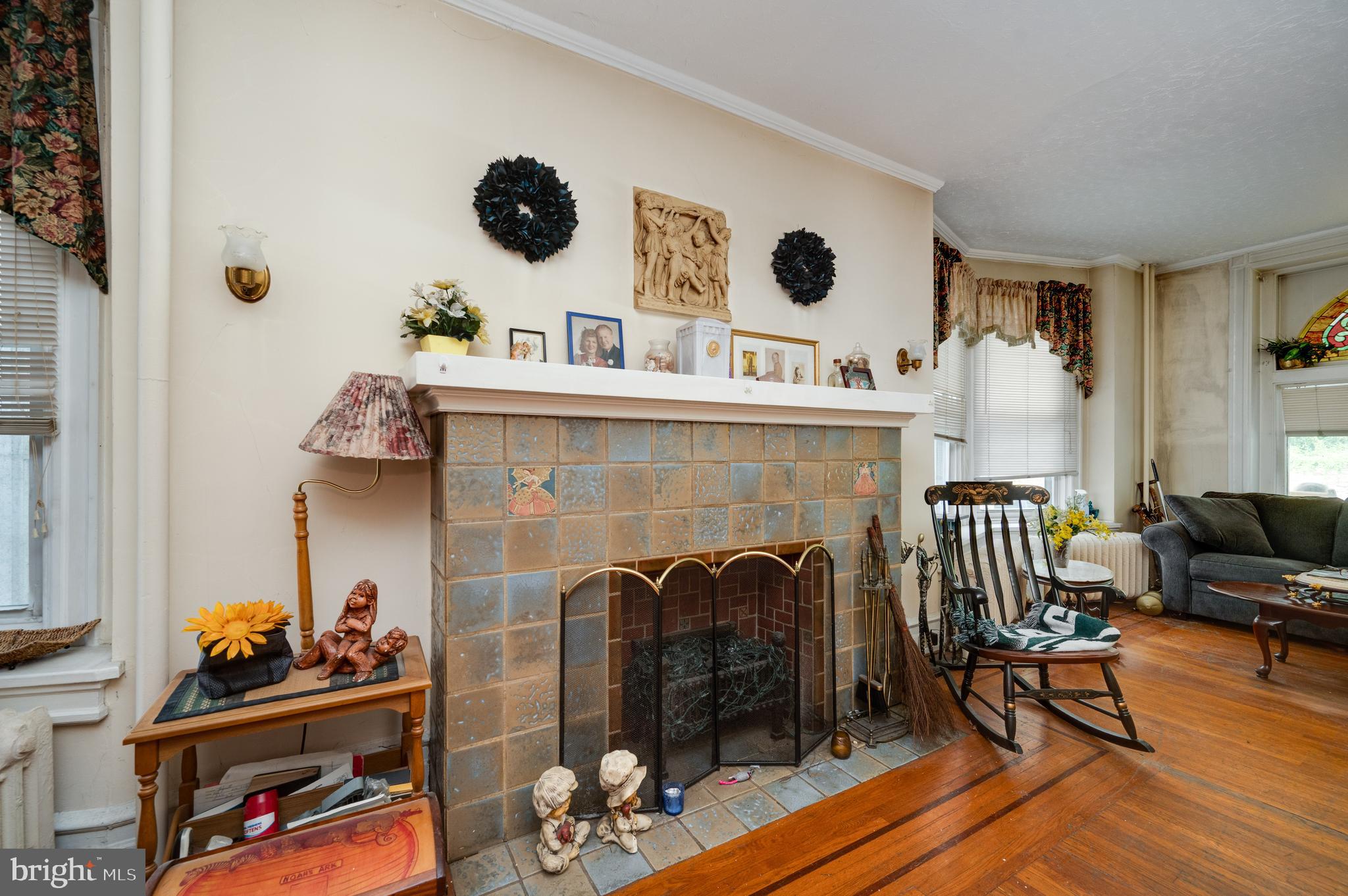 1642 Mineral Spring Road Reading, PA 19602 - Photo 6 of 56 a living room with furniture and a fireplace