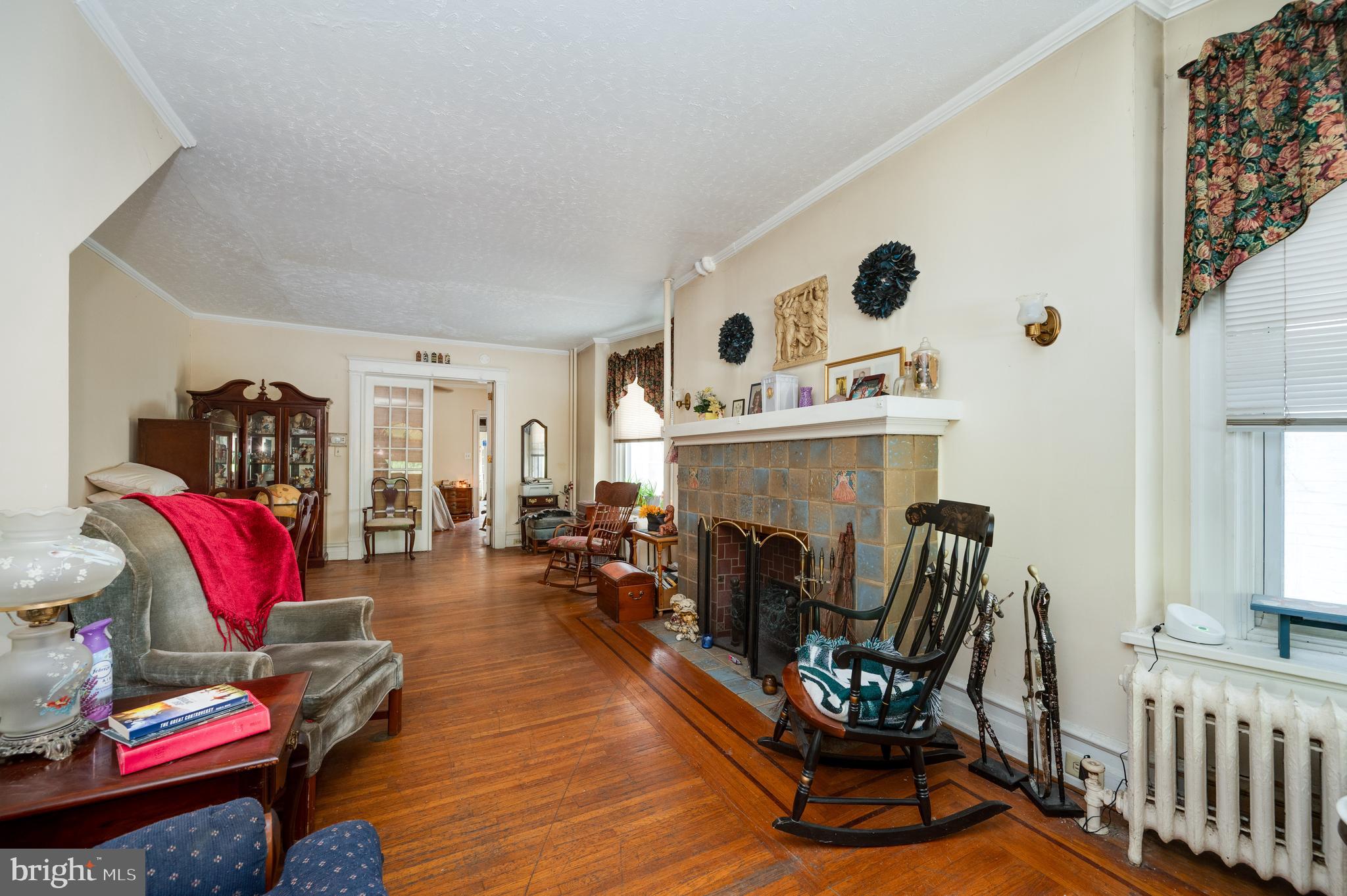 1642 Mineral Spring Road Reading, PA 19602 - Photo 8 of 56 a living room with furniture and a fireplace